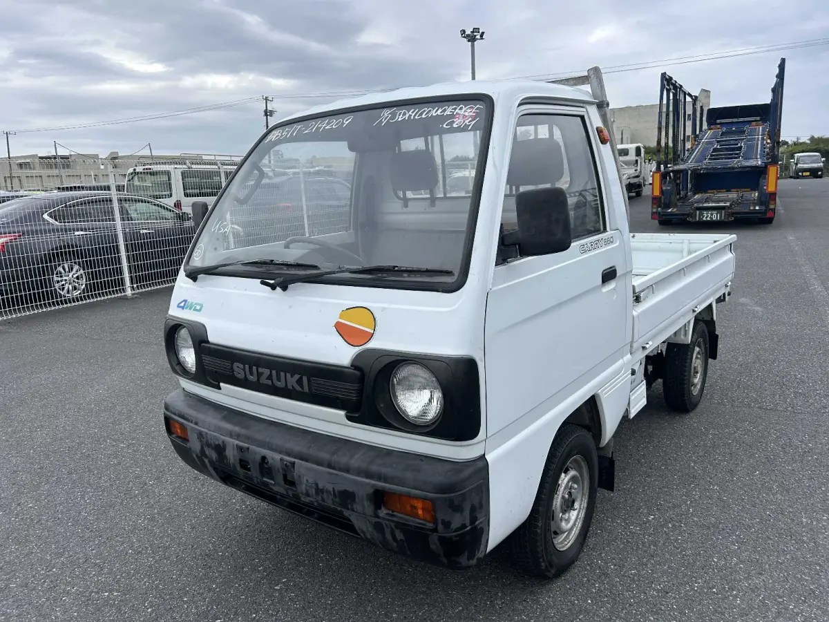 1991 Suzuki Carry, 4WD + Diff Lock, a Kei Truck, for sale at Sunshine Imports in Austin, TX (photo 2 of 12)