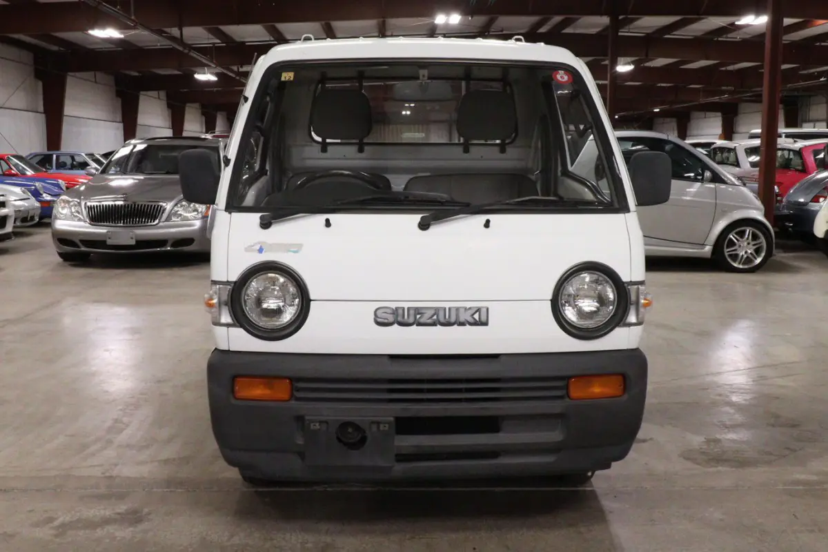 White 1991 Suzuki Carry Dump Bed 4x4 Kei Truck, front view, for sale at Duncan Imports in Christiansburg, VA