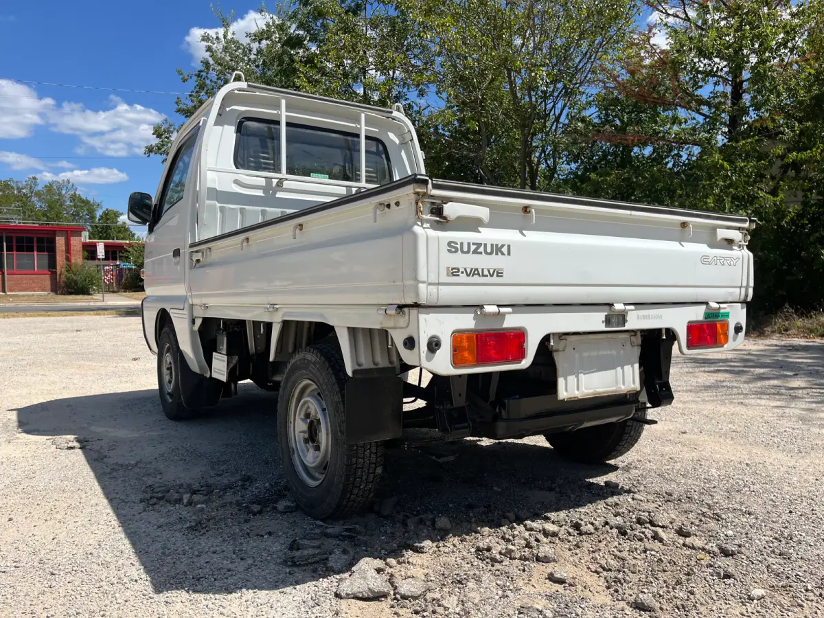 1992 Suzuki Carry, 4WD + AC, a Kei Truck, for sale at Sunshine Imports in Austin, TX (photo 3 of 12)