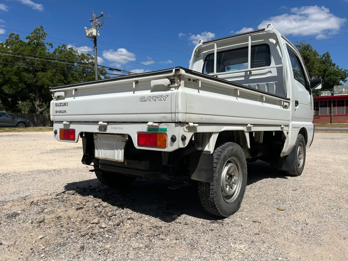 1992 Suzuki Carry, 4WD + AC, a Kei Truck, for sale at Sunshine Imports in Austin, TX (photo 4 of 12)