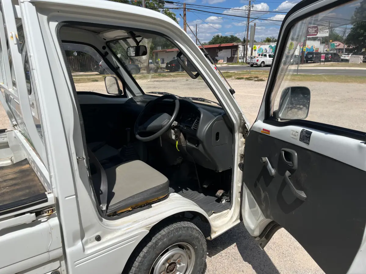 1992 Suzuki Carry, 4WD + AC, a Kei Truck, for sale at Sunshine Imports in Austin, TX (photo 5 of 12)