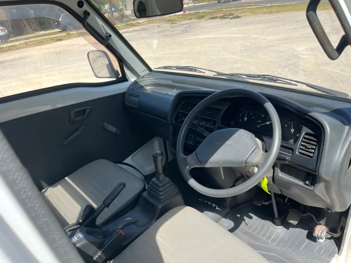 1992 Suzuki Carry, 4WD + AC, a Kei Truck, for sale at Sunshine Imports in Austin, TX (photo 6 of 12)