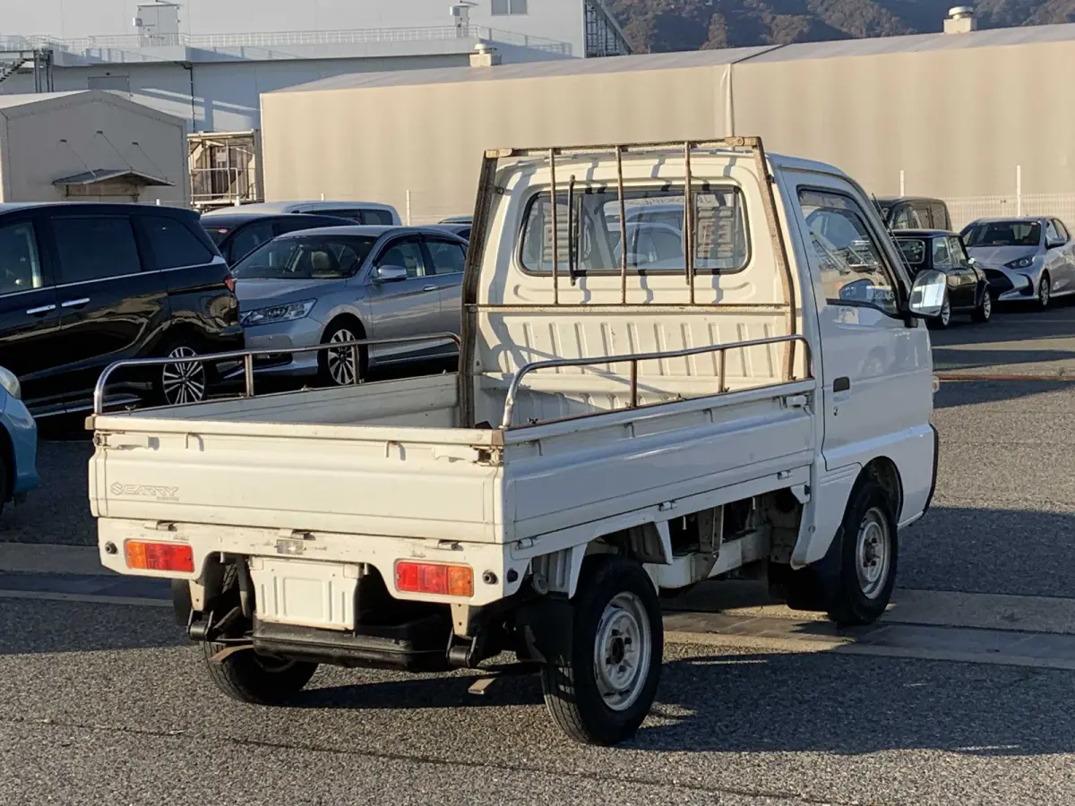 1993 Suzuki Carry, 2WD + Low Miles, a Kei Truck, for sale at Sunshine Imports in Austin, TX (photo 4 of 12)