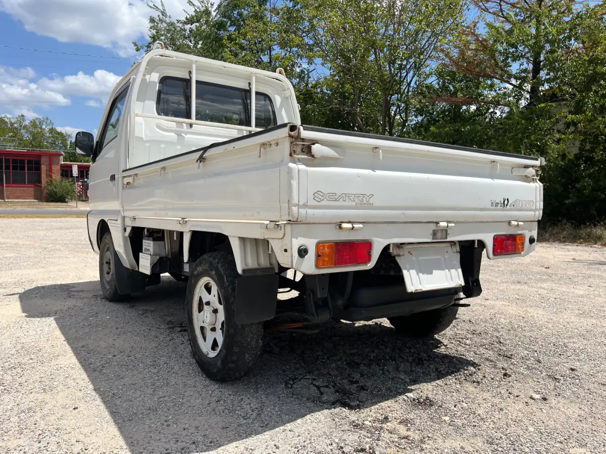 1993 Suzuki Carry, 4WD + AC, a Kei Truck, for sale at Sunshine Imports in Austin, TX (photo 3 of 10)