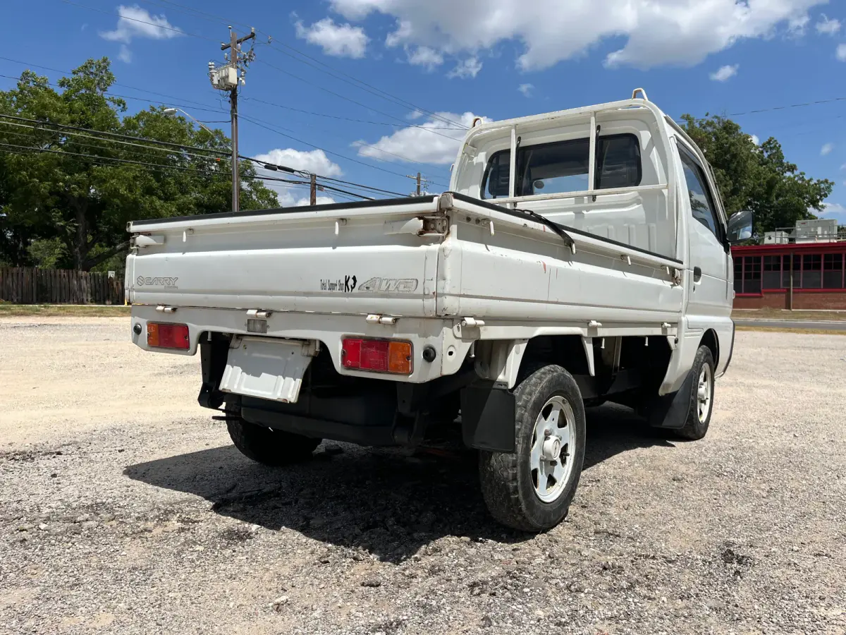 1993 Suzuki Carry, 4WD + AC, a Kei Truck, for sale at Sunshine Imports in Austin, TX (photo 4 of 10)