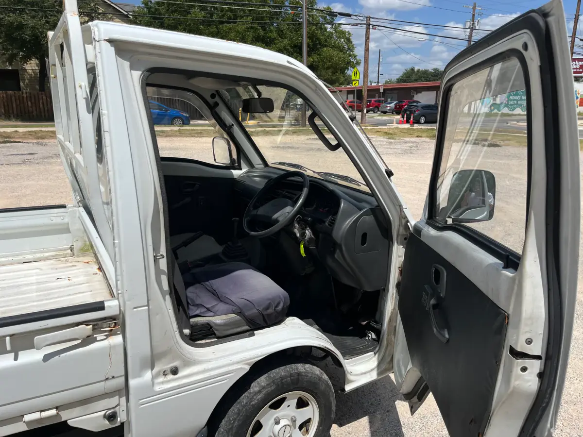 1993 Suzuki Carry, 4WD + AC, a Kei Truck, for sale at Sunshine Imports in Austin, TX (photo 5 of 10)