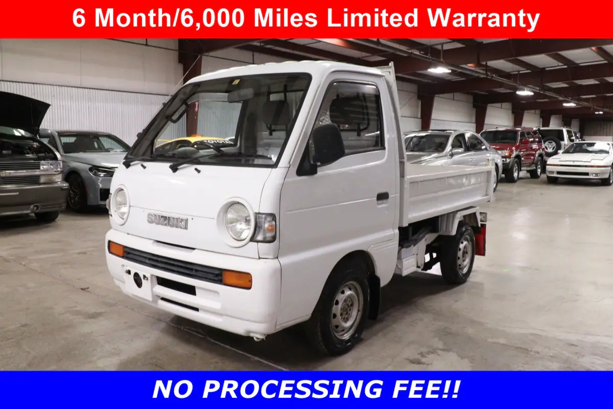 White 1993 Suzuki Carry 4x4 Kei Truck, front three-quarter view, for sale at Duncan Imports in Christiansburg, VA