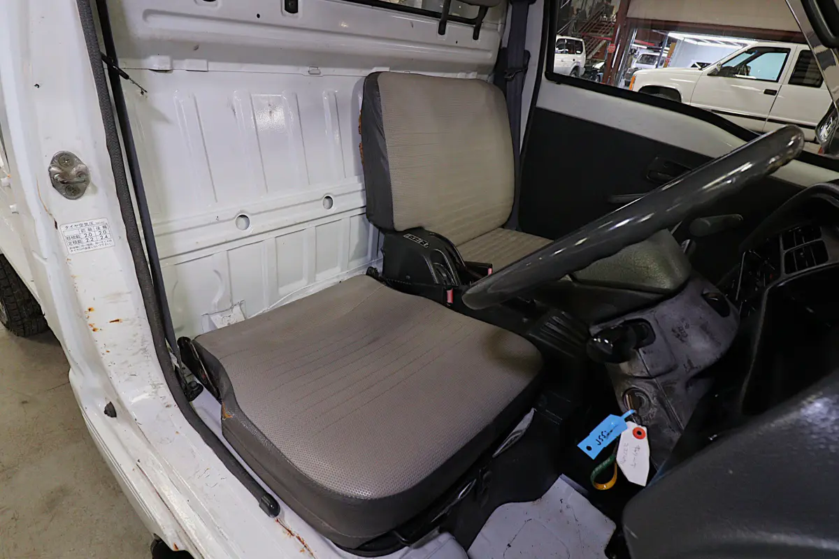 White 1993 Suzuki Carry 4x4 Kei Truck, cab interior and seats, for sale at Duncan Imports in Christiansburg, VA