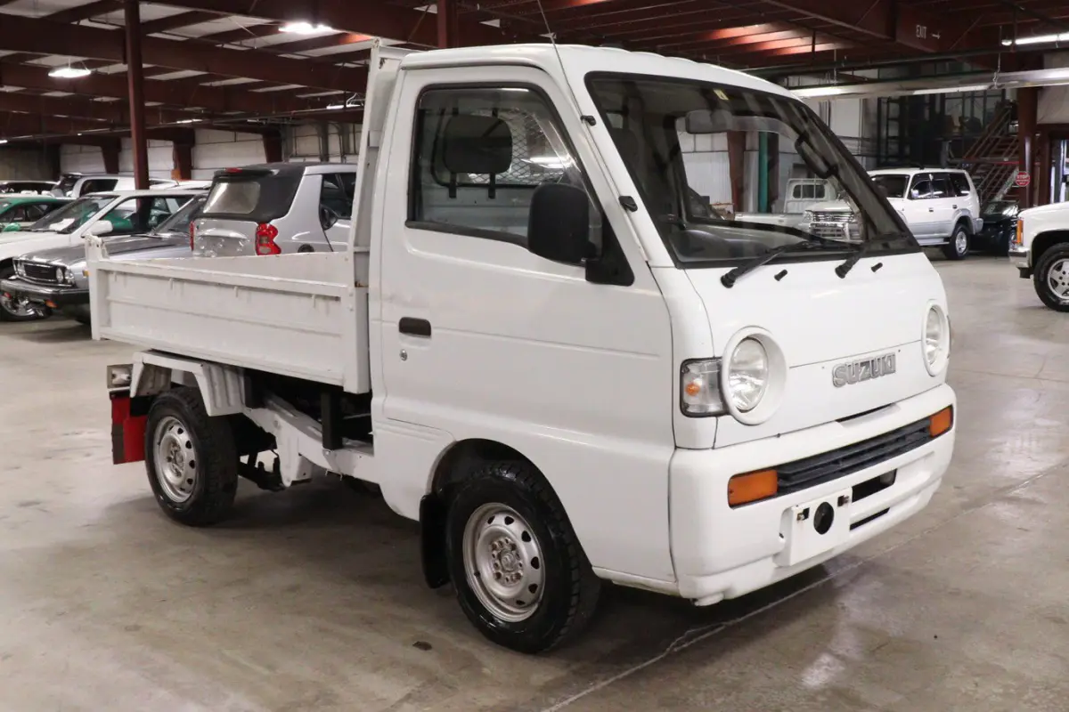 White 1993 Suzuki Carry 4x4 Kei Truck, front three-quarter view, for sale at Duncan Imports in Christiansburg, VA