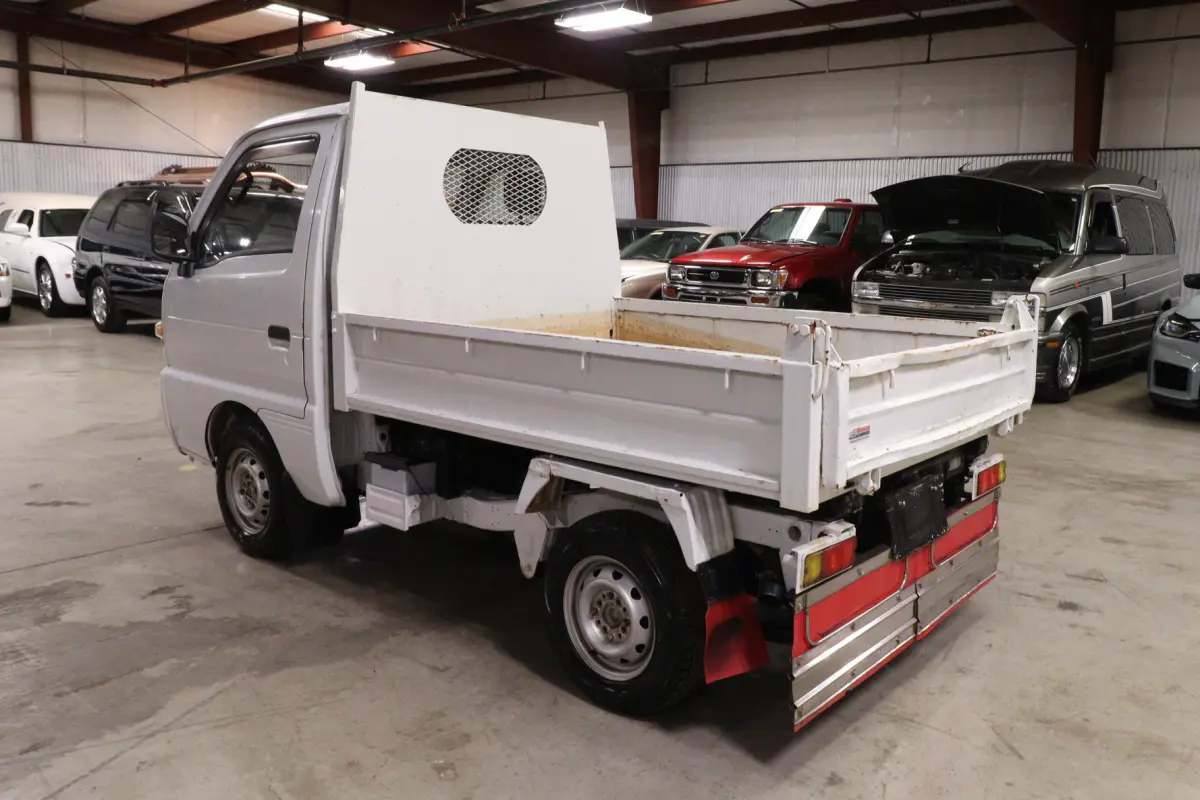 White 1993 Suzuki Carry 4x4 Kei Truck, rear three-quarter view, for sale at Duncan Imports in Christiansburg, VA