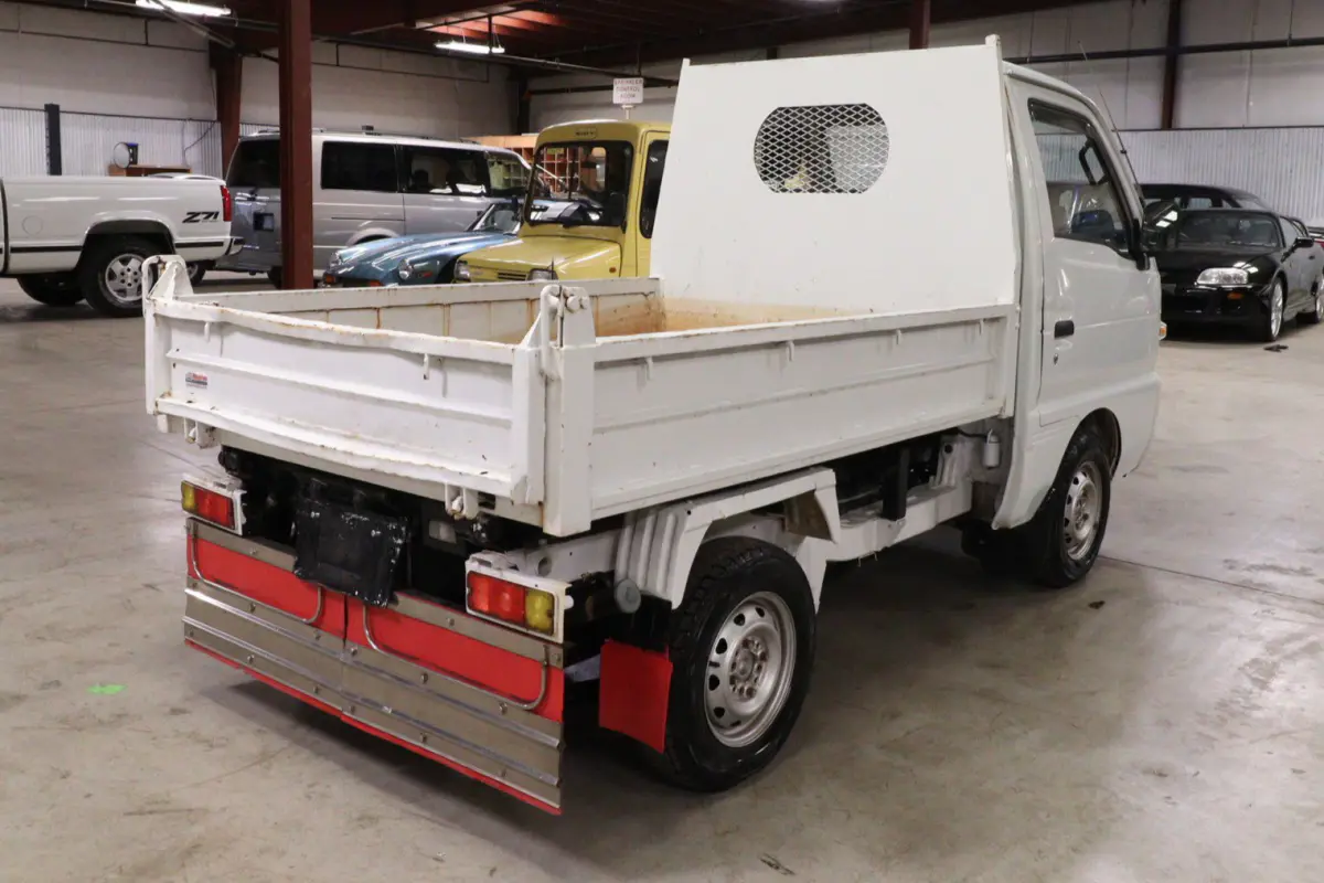 White 1993 Suzuki Carry 4x4 Kei Truck, rear three-quarter view, for sale at Duncan Imports in Christiansburg, VA