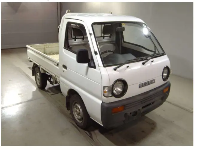 1994 Suzuki Carry, a yellow Kei Truck, for sale at Street Legal Mini Trucks in Philadelphia, PA (photo 2 of 12)