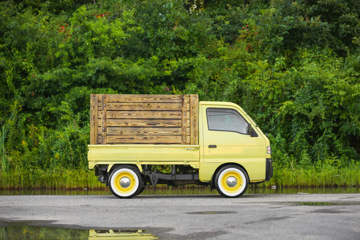 1994 Suzuki Carry, a yellow Kei Truck, for sale at Street Legal Mini Trucks in Philadelphia, PA (photo 4 of 12)