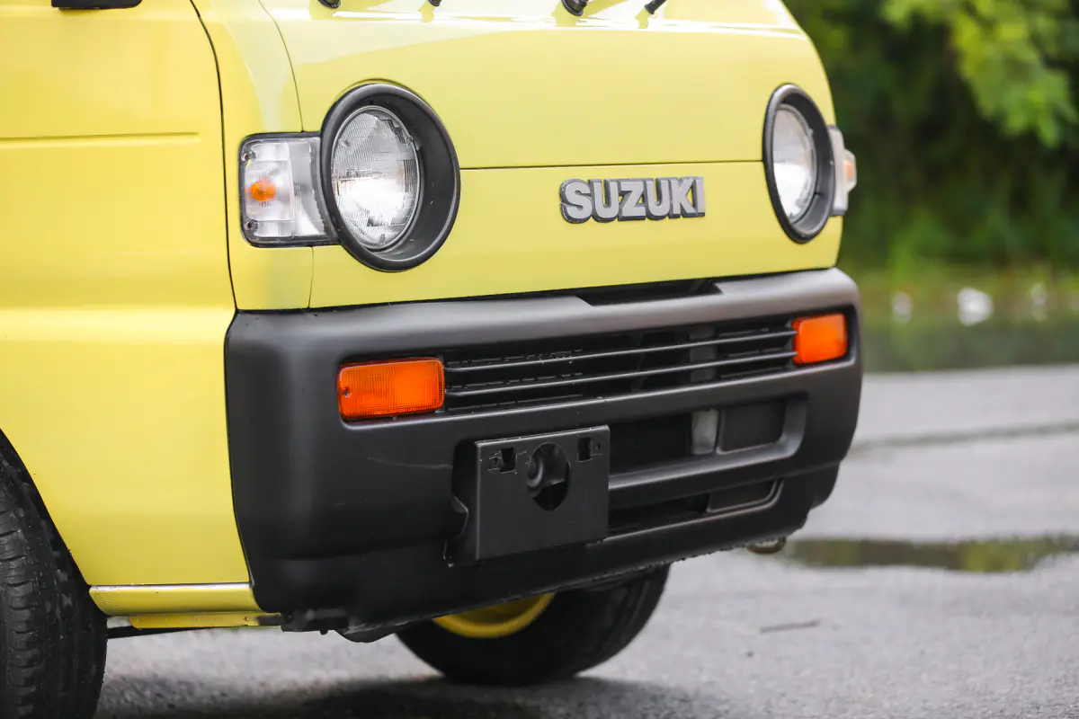 1994 Suzuki Carry, a yellow Kei Truck, for sale at Street Legal Mini Trucks in Philadelphia, PA (photo 7 of 12)