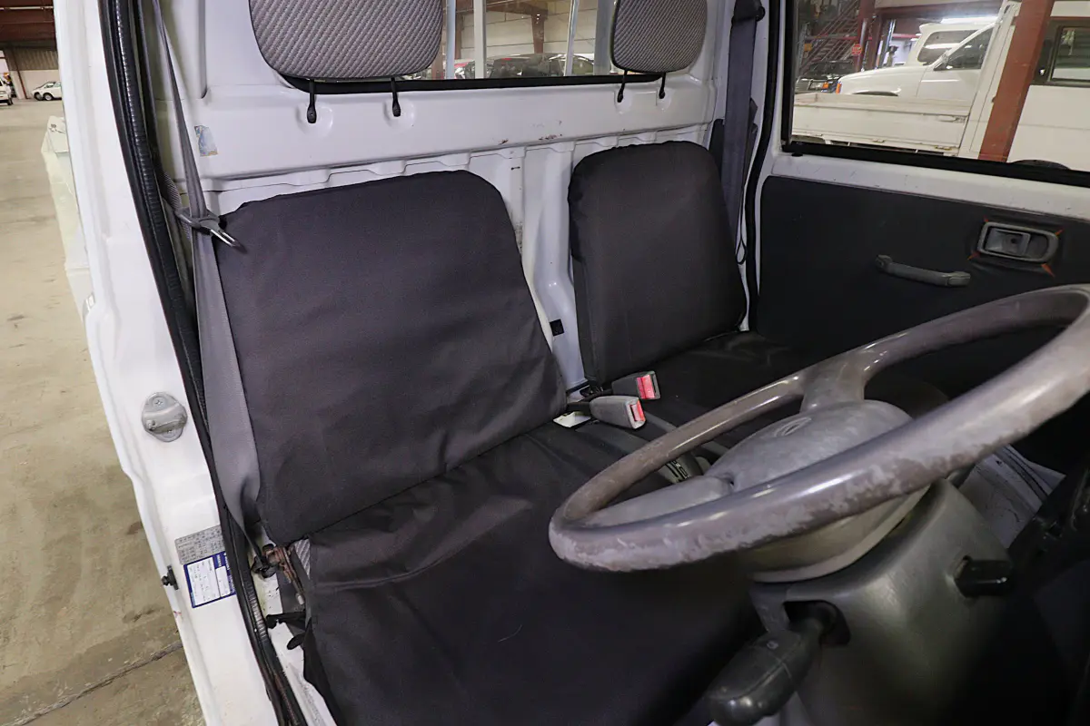 1995 Daihatsu Hijet 4x4 Kei Truck, seats and steering wheel, for sale at Duncan Imports in Christiansburg, VA