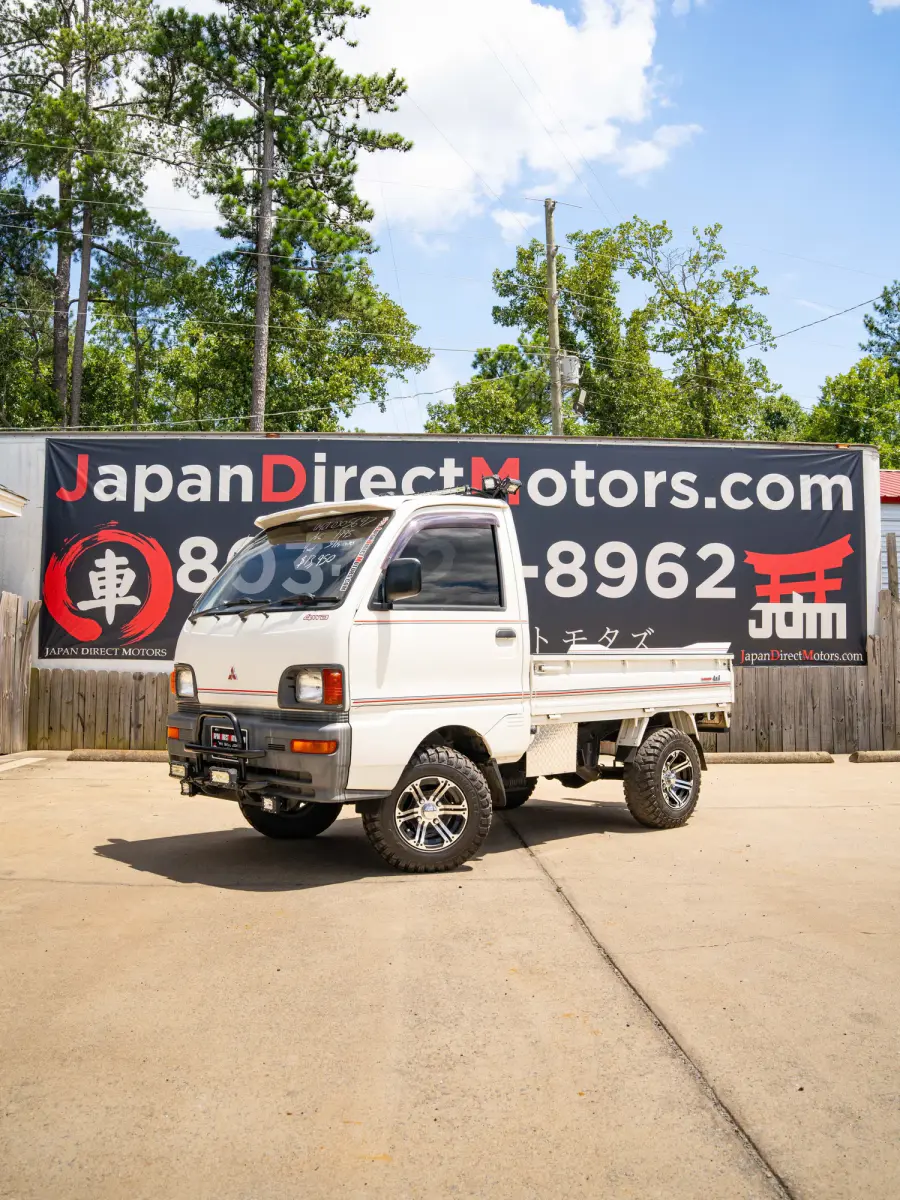 1995 Mitsubishi Minicab Lifted Kei Truck in white, for sale at Japan Direct Motors in Irmo, SC (photo 1 of 12)