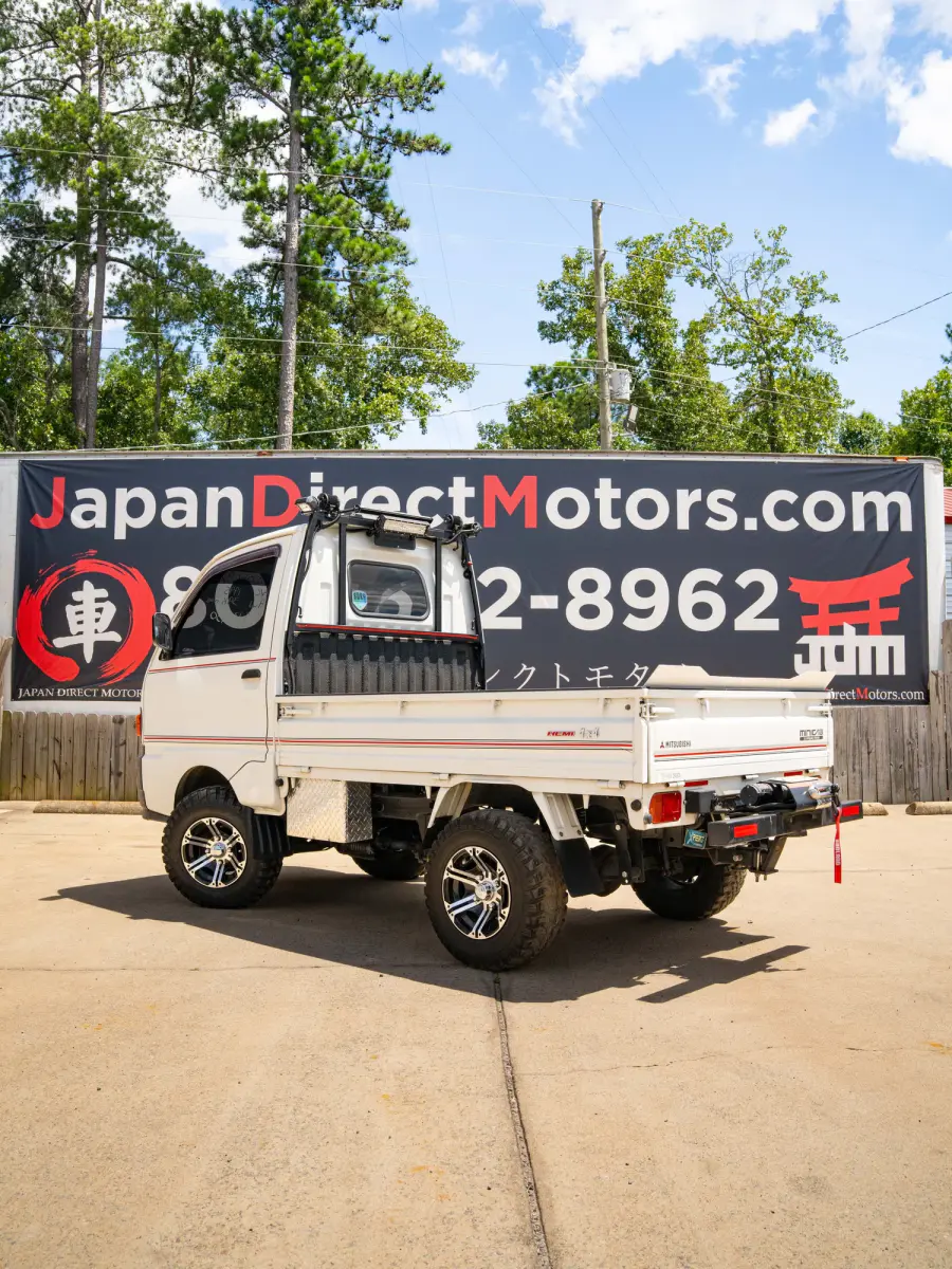 1995 Mitsubishi Minicab Lifted Kei Truck in white, for sale at Japan Direct Motors in Irmo, SC (photo 2 of 12)