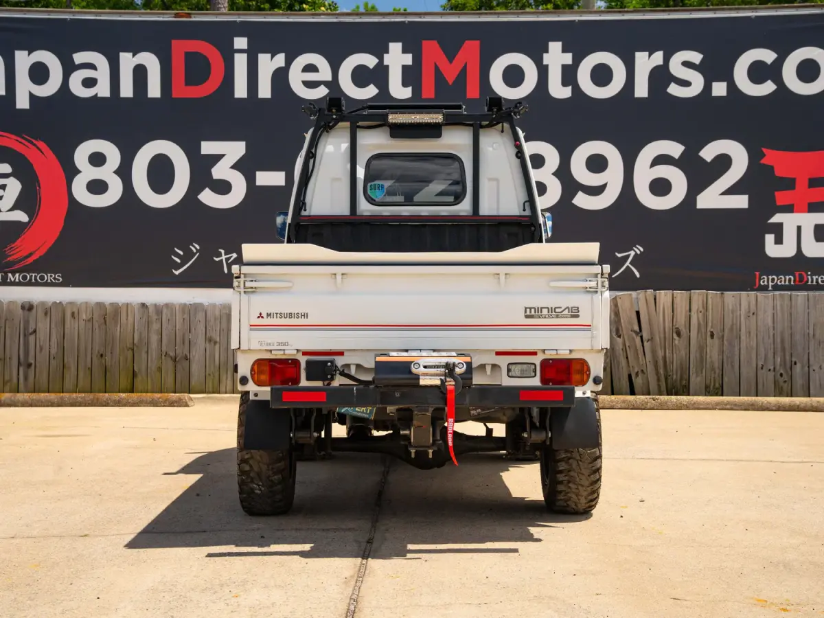 1995 Mitsubishi Minicab Lifted Kei Truck in white, for sale at Japan Direct Motors in Irmo, SC (photo 8 of 12)