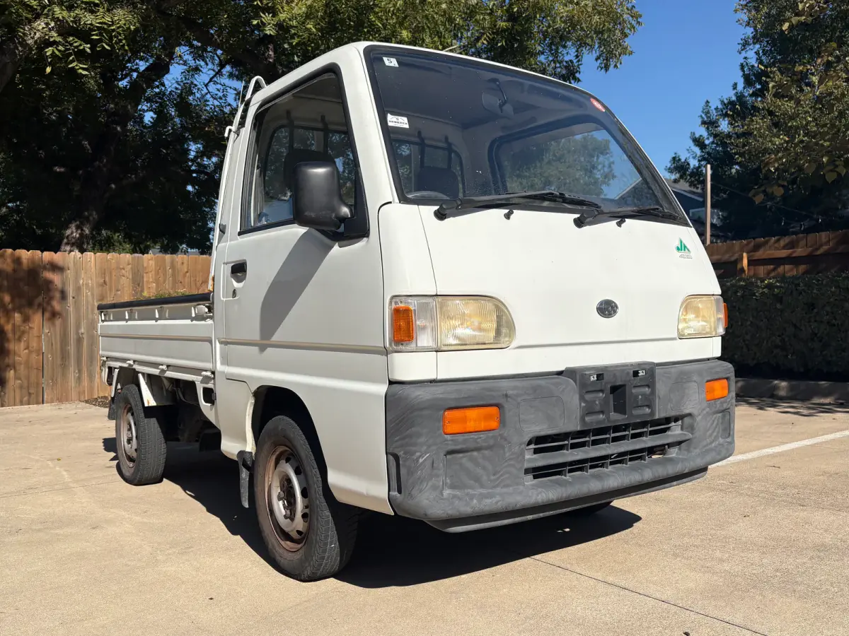 1995 Subaru Sambar 4x4 Kei Truck, front three-quarter view, for sale at Sunshine Imports in Austin, TX