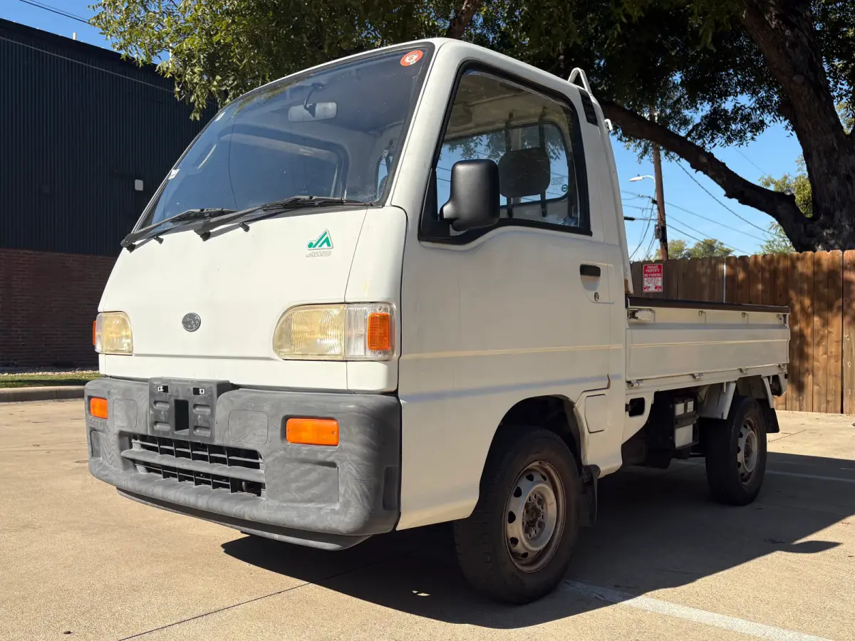 1995 Subaru Sambar 4x4 Kei Truck, front three-quarter view, for sale at Sunshine Imports in Austin, TX