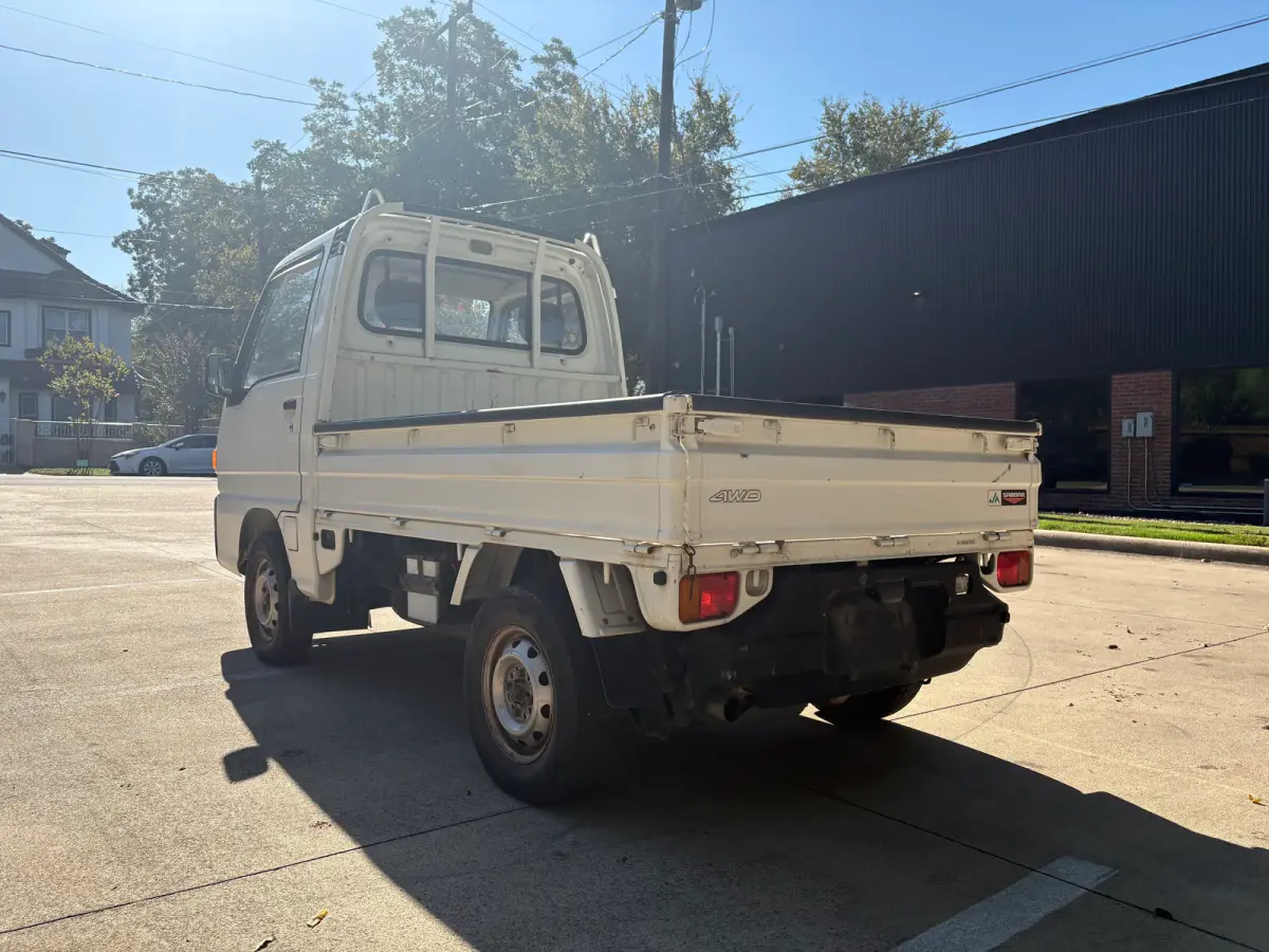 1995 Subaru Sambar 4x4 Kei Truck, rear three-quarter view, for sale at Sunshine Imports in Austin, TX