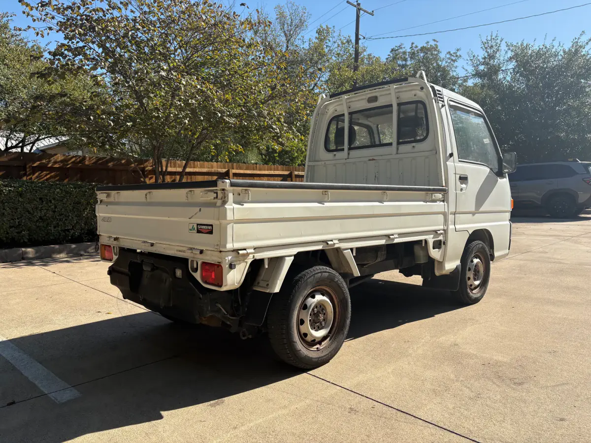 1995 Subaru Sambar 4x4 Kei Truck, rear three-quarter view, for sale at Sunshine Imports in Austin, TX