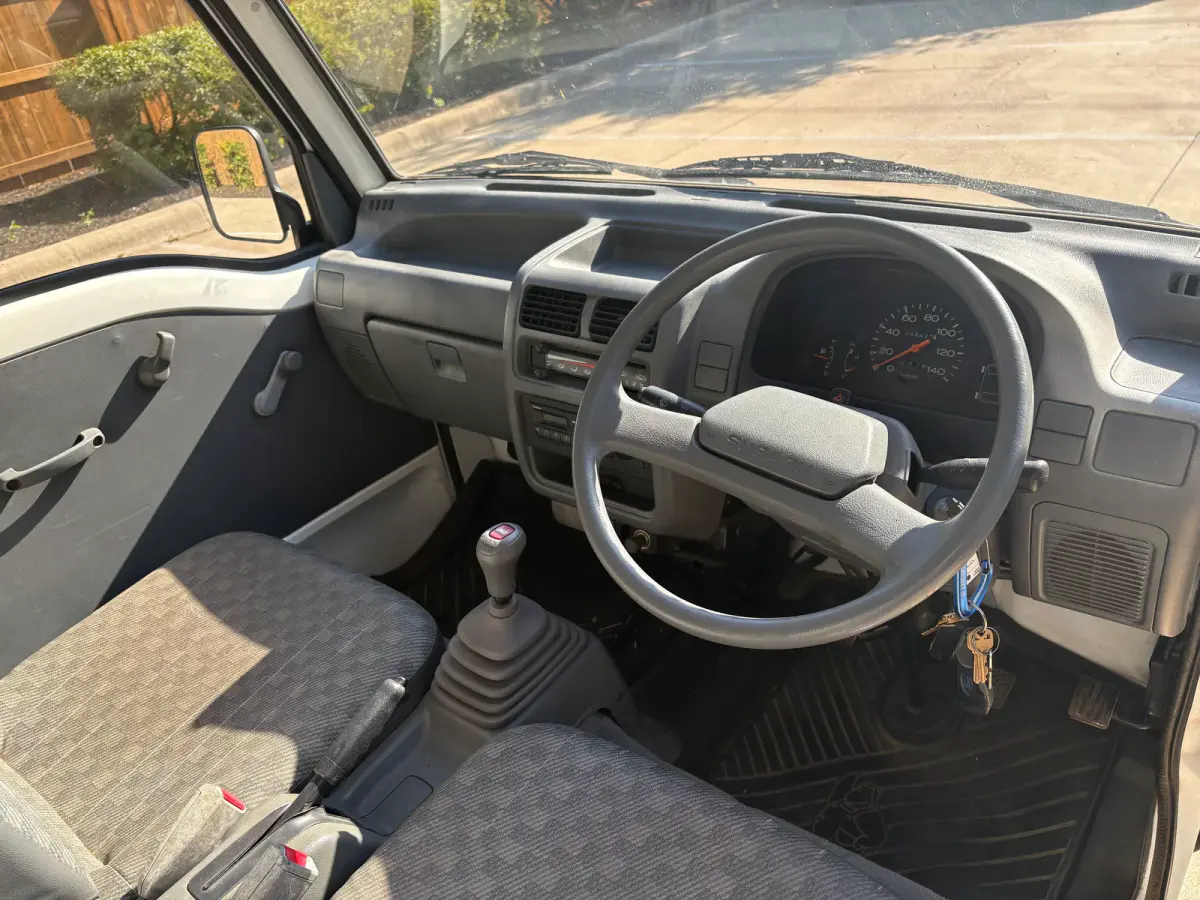 1995 Subaru Sambar 4x4 Kei Truck, cab interior, for sale at Sunshine Imports in Austin, TX