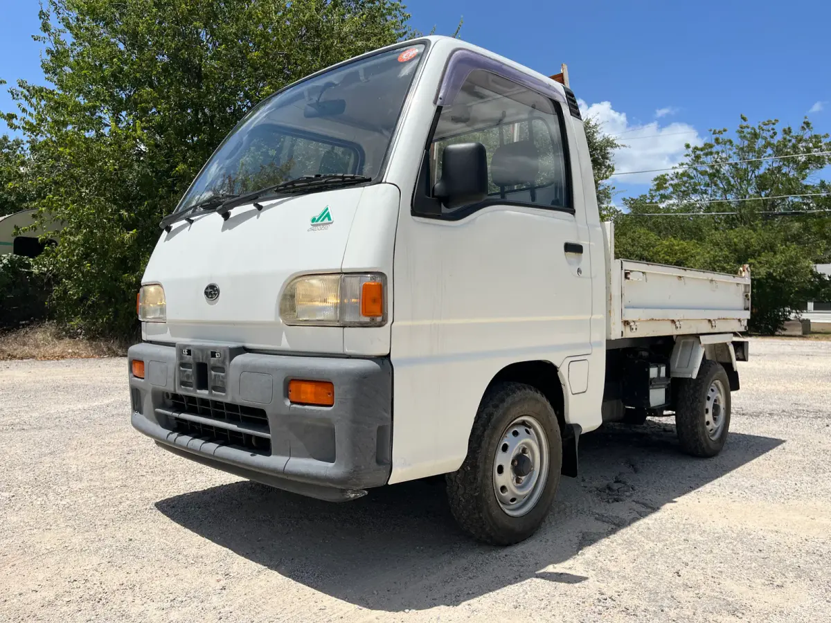 1995 Subaru Sambar Dump Truck, 4WD + AC, a Kei Truck, for sale at Sunshine Imports in Austin, TX (photo 2 of 12)