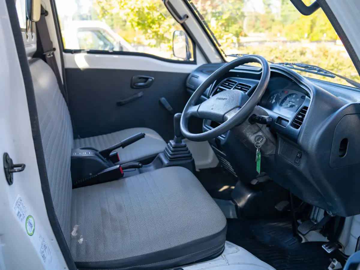 White 1995 Suzuki Carry 4x4 Kei Truck, cab interior, for sale at Japan Direct Motors in Irmo, SC