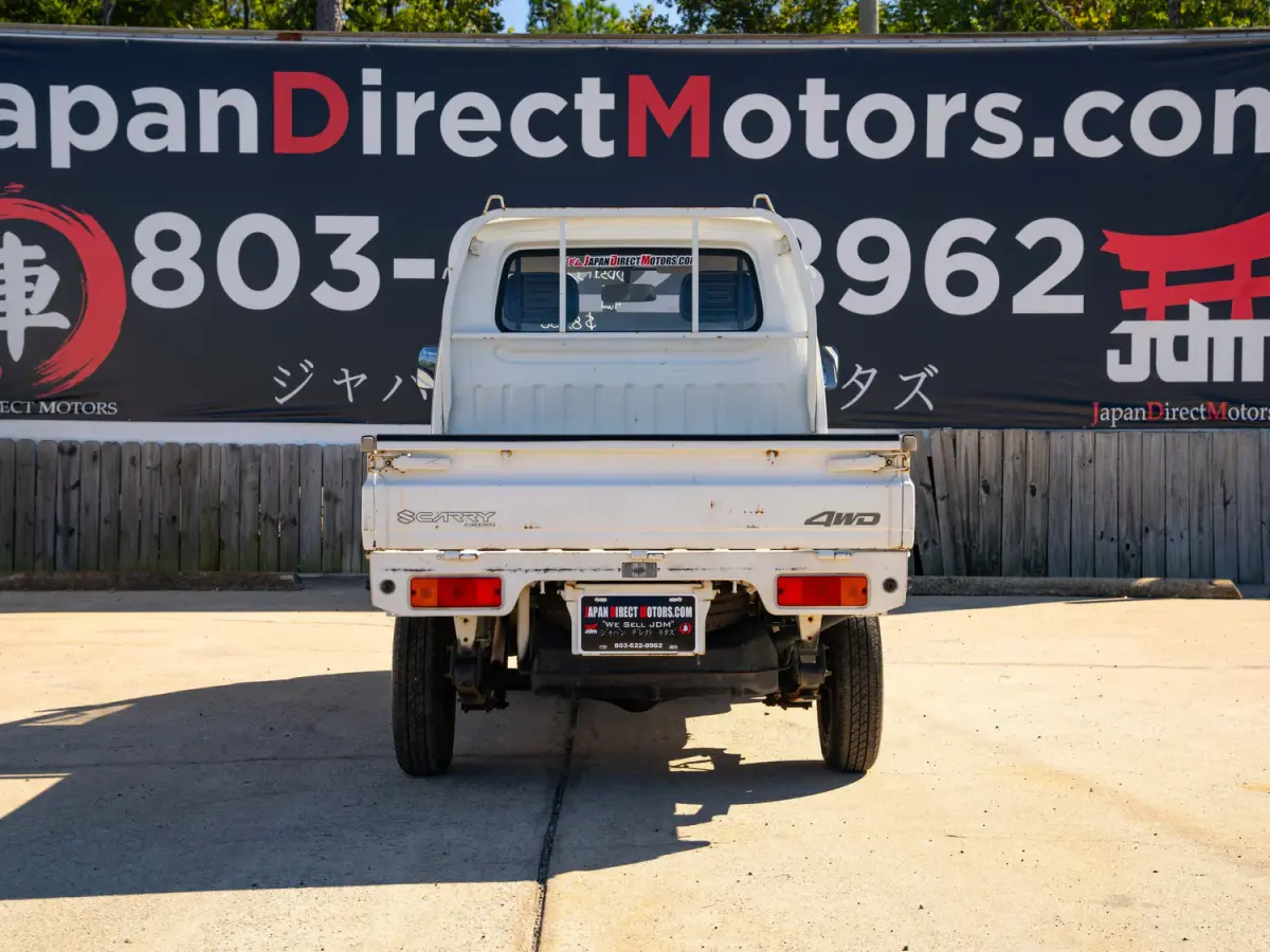 White 1995 Suzuki Carry 4x4 Kei Truck, rear view, for sale at Japan Direct Motors in Irmo, SC