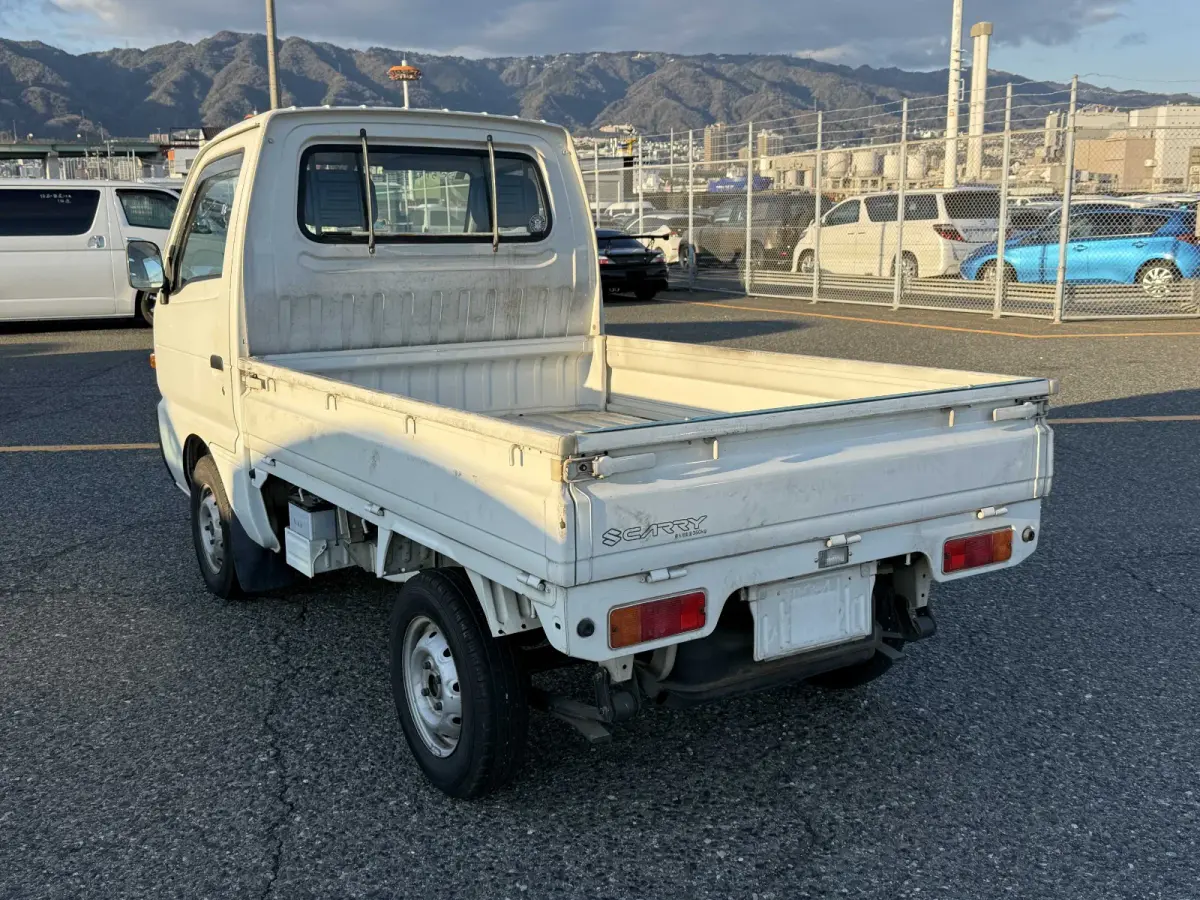 1995 Suzuki Carry, 2WD + AC, a Kei Truck, for sale at Sunshine Imports in Austin, TX (photo 4 of 10)
