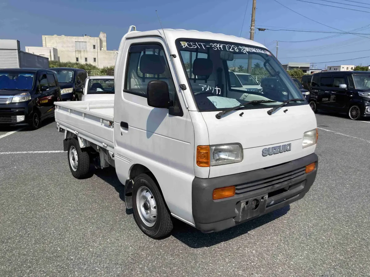 1995 Suzuki Carry, 2WD + Low Miles, a Kei Truck, for sale at Sunshine Imports in Austin, TX (photo 1 of 11)