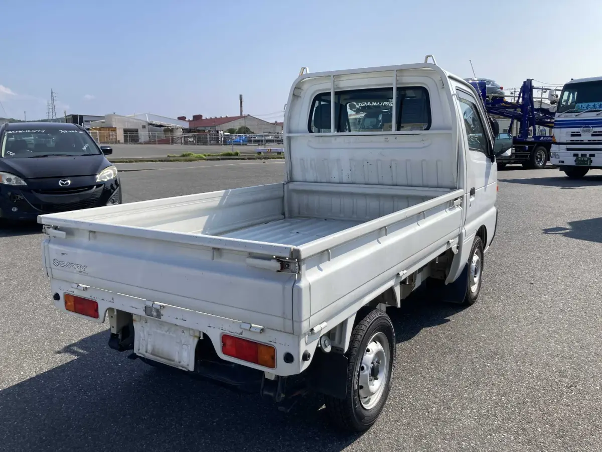 1995 Suzuki Carry, 2WD + Low Miles, a Kei Truck, for sale at Sunshine Imports in Austin, TX (photo 3 of 11)