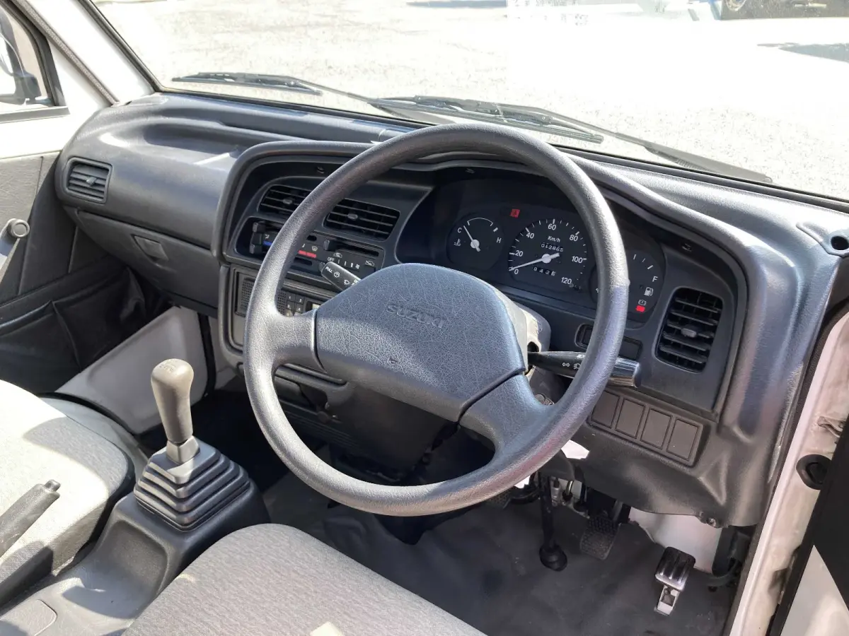1995 Suzuki Carry, 2WD + Low Miles, a Kei Truck, for sale at Sunshine Imports in Austin, TX (photo 8 of 11)