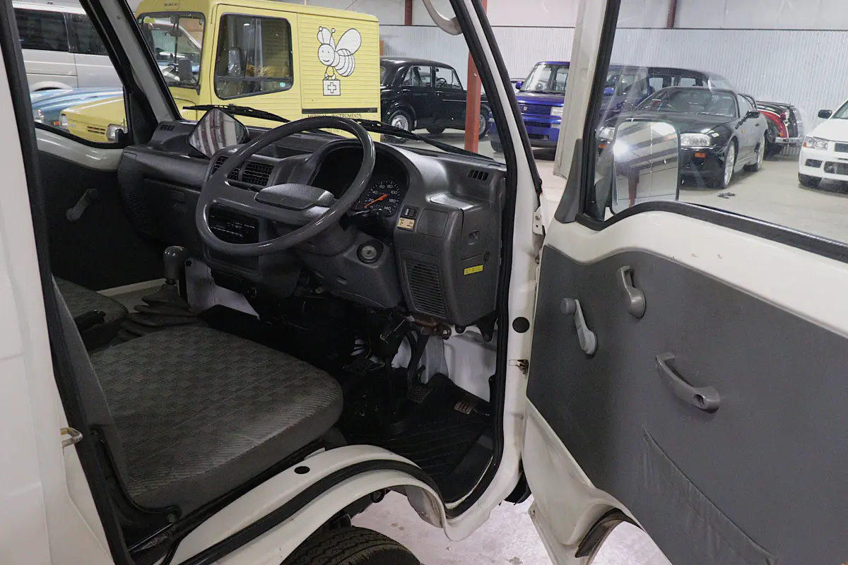 1996 Subaru Sambar 4x4 Kei Truck, cab interior with open door, for sale at Duncan Imports in Christiansburg, VA