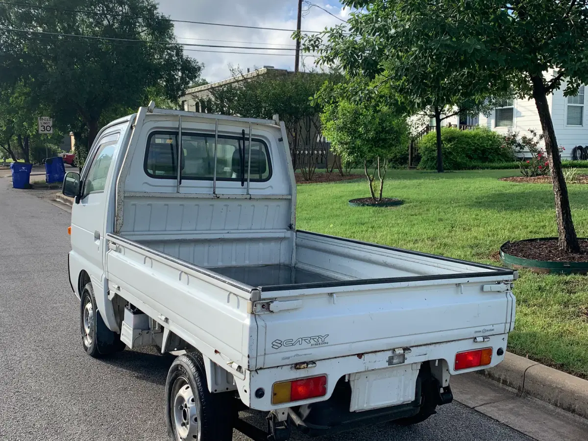 1996 Suzuki Carry, 2WD + Low Miles, a Kei Truck, for sale at Sunshine Imports in Austin, TX (photo 3 of 6)