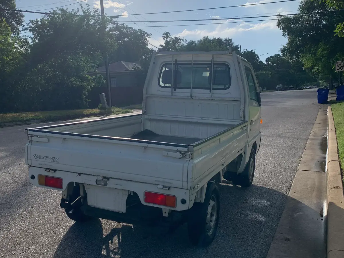 1996 Suzuki Carry, 2WD + Low Miles, a Kei Truck, for sale at Sunshine Imports in Austin, TX (photo 4 of 6)