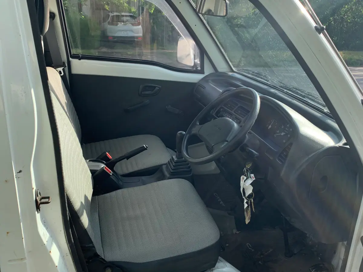 1996 Suzuki Carry, 2WD + Low Miles, a Kei Truck, for sale at Sunshine Imports in Austin, TX (photo 6 of 6)