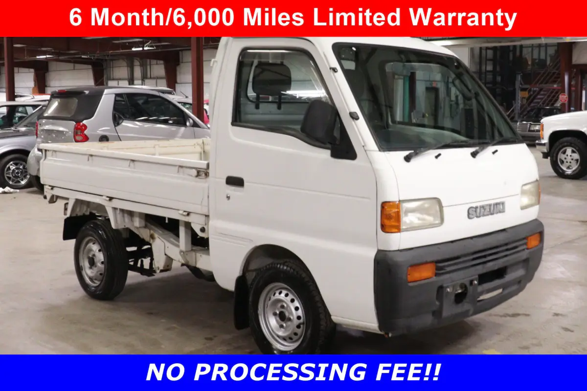 White 1996 Suzuki Carry Dump Bed 4x4 Kei Truck, front three-quarter view, for sale at Duncan Imports in Christiansburg, VA