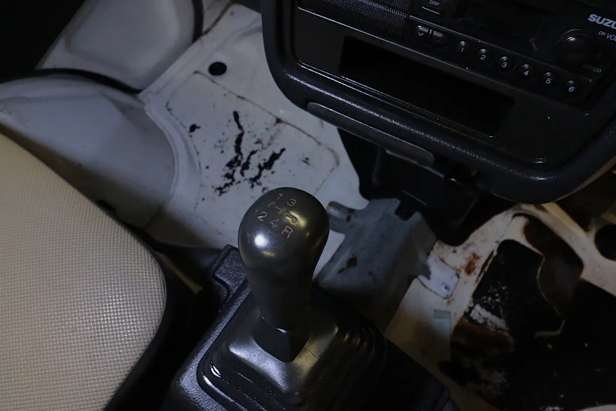 White 1996 Suzuki Carry Dump Bed 4x4 Kei Truck, gear shifter, for sale at Duncan Imports in Christiansburg, VA