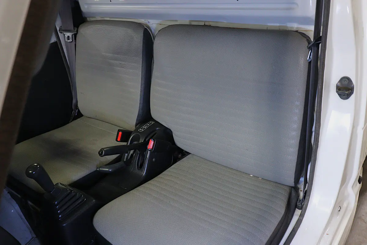 White 1996 Suzuki Carry Dump Bed 4x4 Kei Truck, seats, for sale at Duncan Imports in Christiansburg, VA