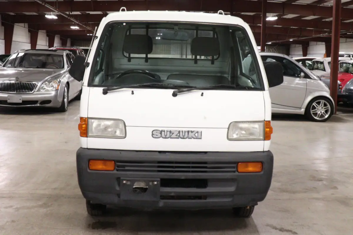 White 1996 Suzuki Carry Dump Bed 4x4 Kei Truck, front view, for sale at Duncan Imports in Christiansburg, VA