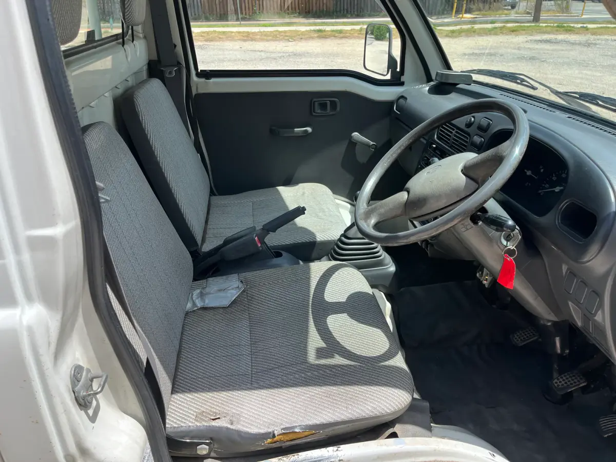 1997 Daihatsu Hijet 4x4 Kei Truck, cab interior with seats, for sale at Sunshine Imports in Austin, TX