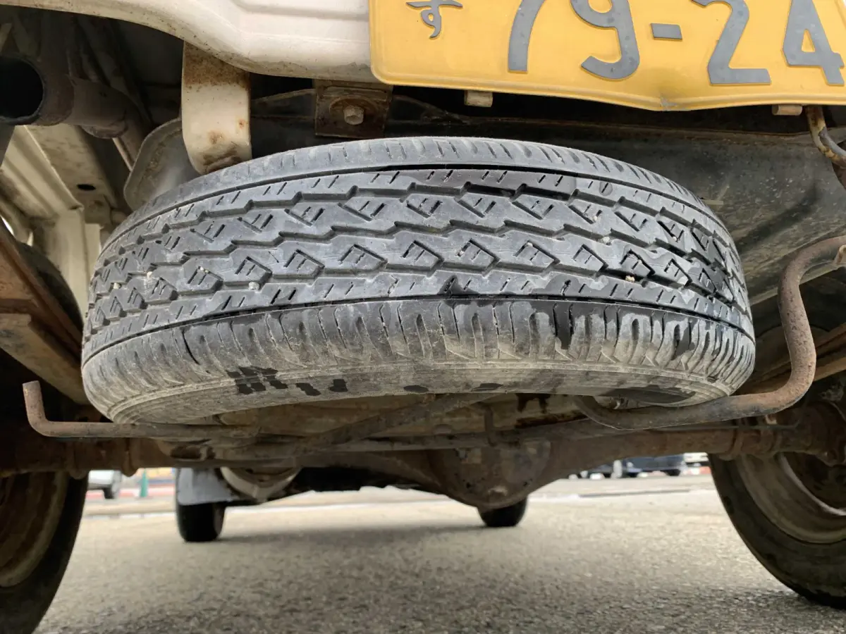 1997 Daihatsu Hijet 4x4 Kei Truck, spare tire mounted underneath, for sale at Sunshine Imports in Austin, TX