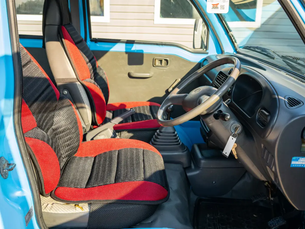 1997 Daihatsu Hijet DeckVan, a blue Kei Truck, for sale at Japan Direct Motors in Irmo, SC (photo 11 of 12)
