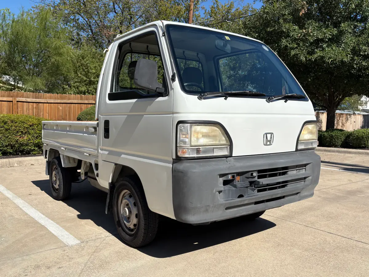 1997 Honda Acty 4x4 Kei Truck, front three-quarter view, for sale at Sunshine Imports in Austin, TX