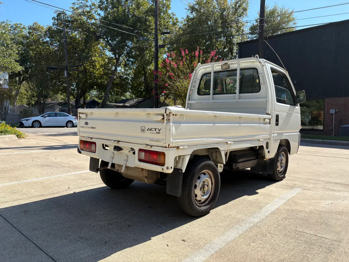 1997 Honda Acty 4x4 Kei Truck, rear three-quarter view, for sale at Sunshine Imports in Austin, TX