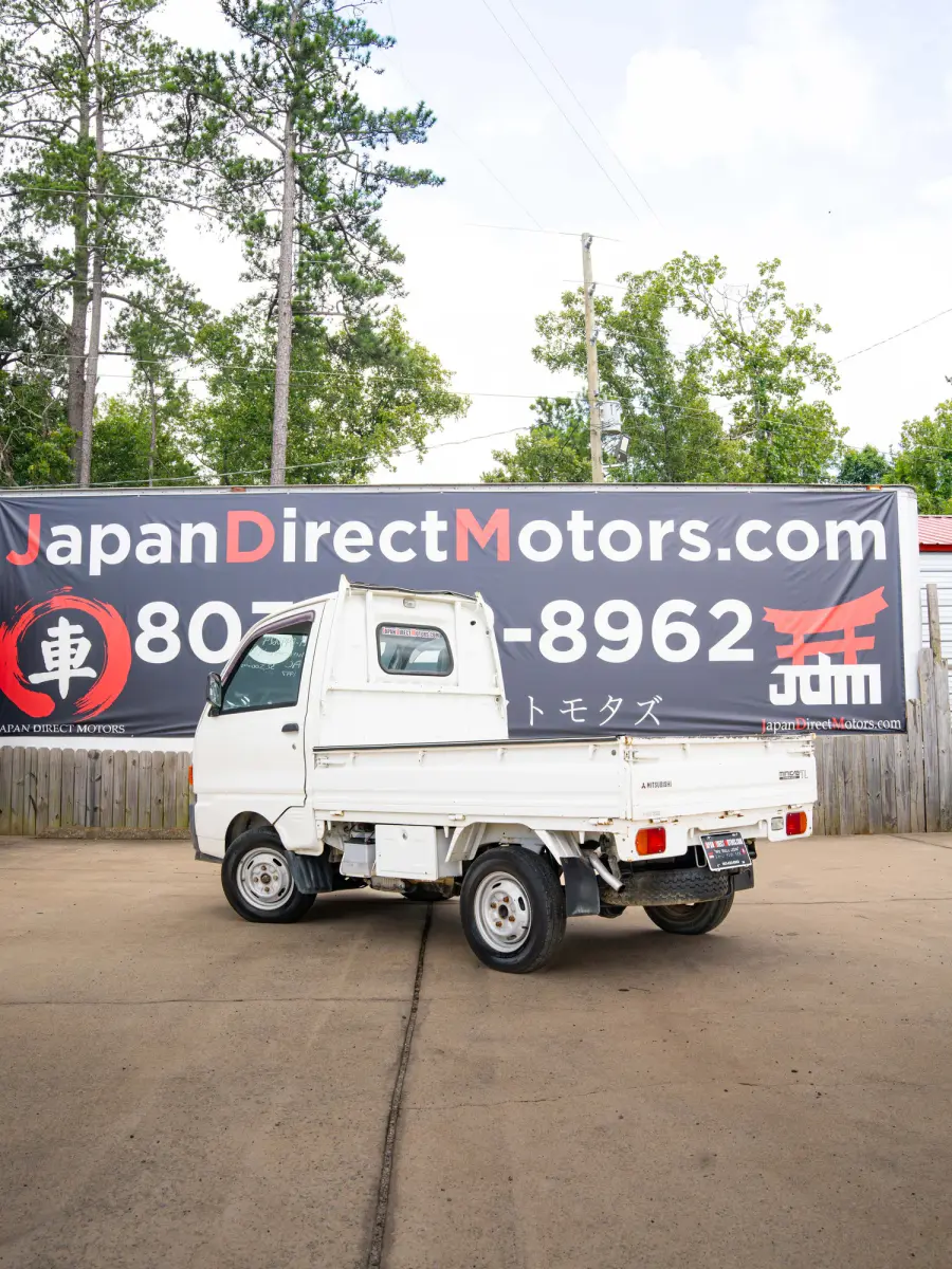 1997 Mitsubishi Minicab Automatic, a white Kei Truck, for sale at Japan Direct Motors in Irmo, SC (photo 2 of 12)