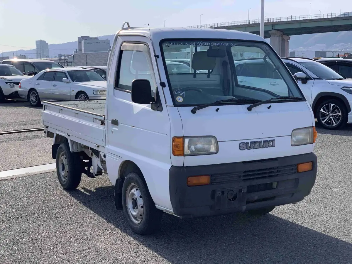 1997 Suzuki Carry, 4WD and AC, a Kei Truck, for sale at Sunshine Imports in Austin, TX (photo 1 of 11)