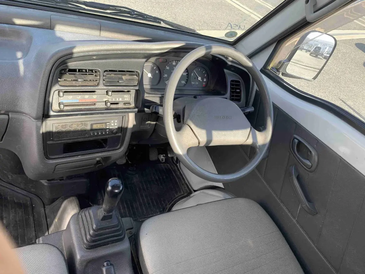 1997 Suzuki Carry, 4WD and AC, a Kei Truck, for sale at Sunshine Imports in Austin, TX (photo 8 of 11)
